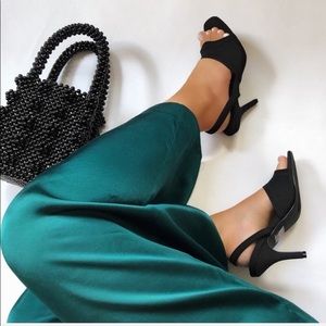 Black sling back heel. Size 7.5